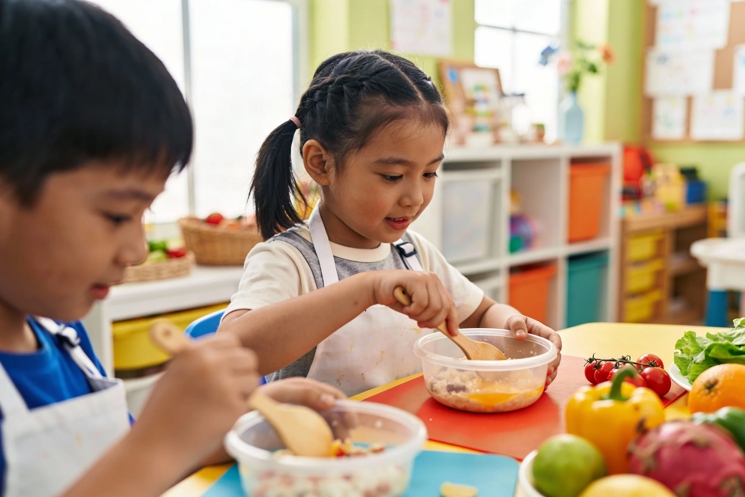 Children participating in an in-person cooking class